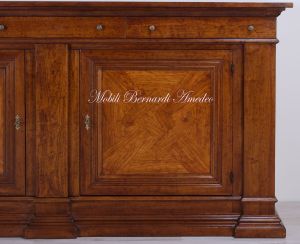 Sideboard in walnut wood with inlaid olive wood doors